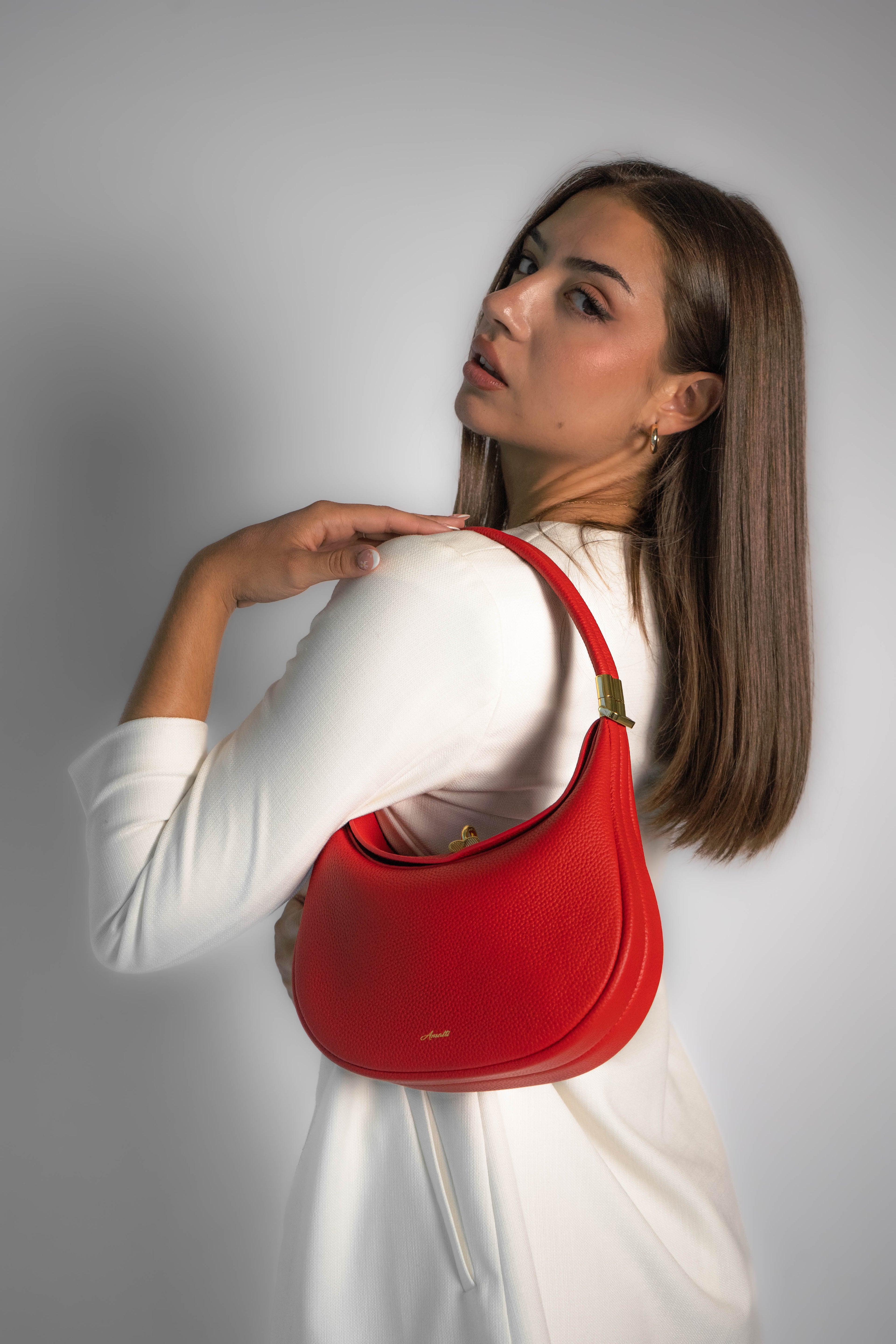 Detalle en piel del bolso Rouge Désir, bolsos elegantes para mujer